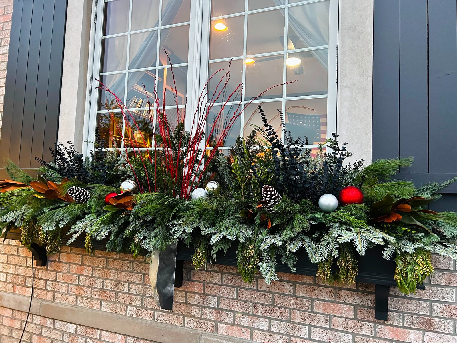 Holiday window greenery — M&J Landscaping